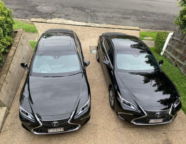 two lexus hybrid's parked next to each other