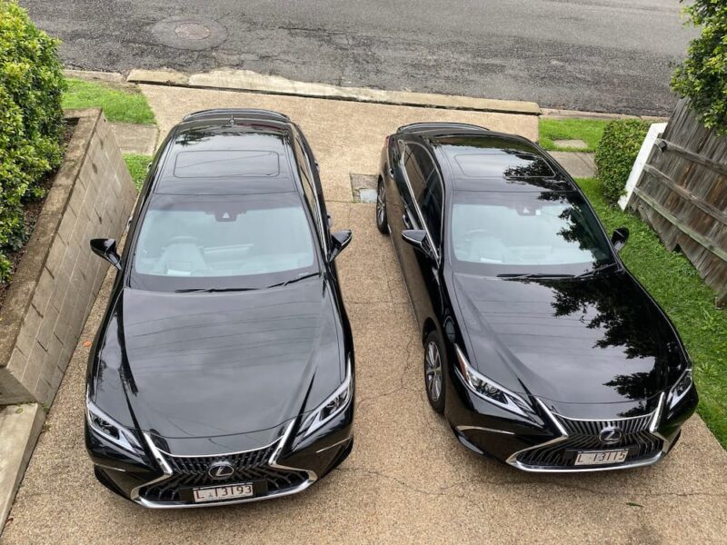 two lexus hybrid's parked next to each other