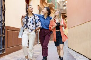 female best friends walking down the street